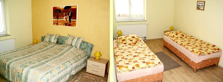 Doppelbett im ersten Schlafzimmer sowie Einzelliegen im zweiten Schlafzimmer